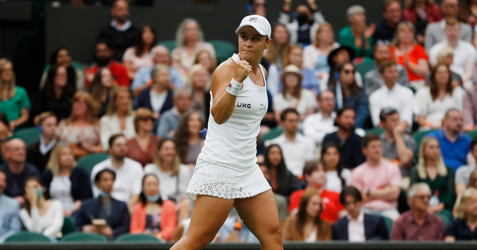 Top-seeded Barty marches past Siniakova and into round two