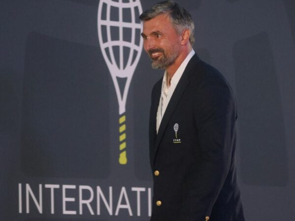 Former tennis player Goran Ivanisevic of Croatia smiles after being inducted into the International Tennis Hall of Fame