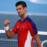 Men's Singles - Quarterfinal - Ariake Tennis Park - Tokyo, Japan - July 29, 2021 Novak Djokovic of Serbia celebrates after winning his quarterfinal match against Kei Nishikori of Japan