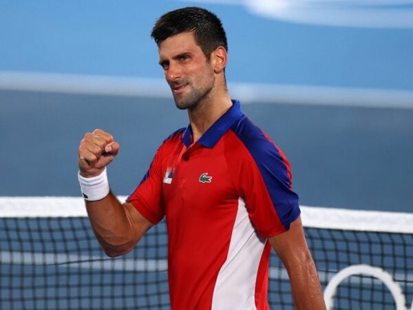 Men's Singles - Quarterfinal - Ariake Tennis Park - Tokyo, Japan - July 29, 2021 Novak Djokovic of Serbia celebrates after winning his quarterfinal match against Kei Nishikori of Japan