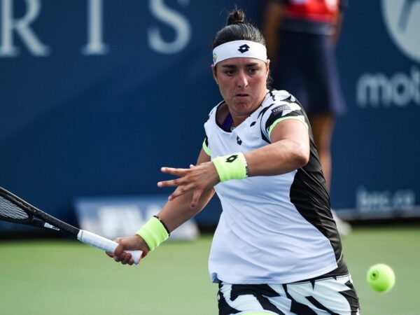 MONTREAL, QC - AUGUST 09: Ons Jabeur (TUN) returns the ball during the first round WTA National Bank Open match on August 9, 2021 at IGA Stadium in Montreal, QC