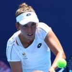 Caption: Tokyo 2020 Olympics - Tennis - Women's Singles - Round 1 - Ariake Tennis Park - Tokyo, Japan - July 25, 2021. Elise Mertens of Belgium in action