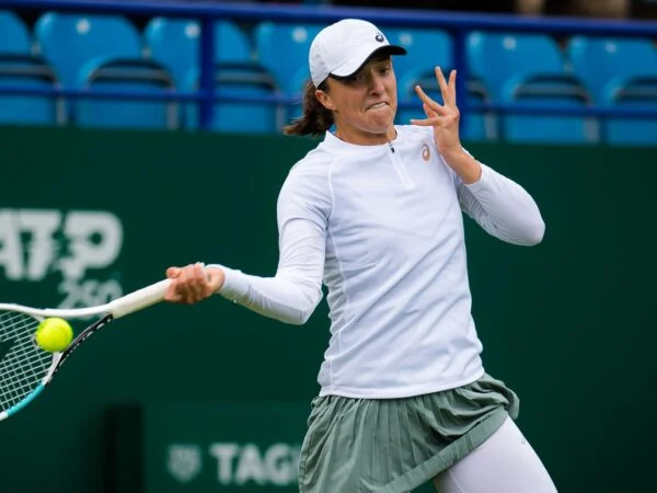 Iga Swiatek of Poland in action during the first round at the 2021 Viking International WTA 500 tennis tournament in Eastbourne
