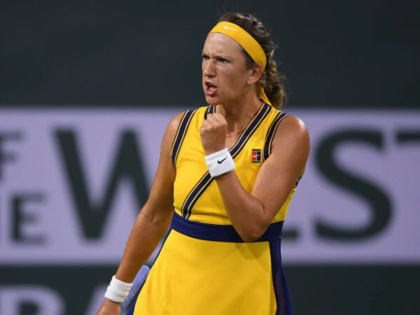Victoria Azarenka (BLR) celebrates after winning a game against Petra Kvitova (CZE) at Indian Wells Tennis Garden.