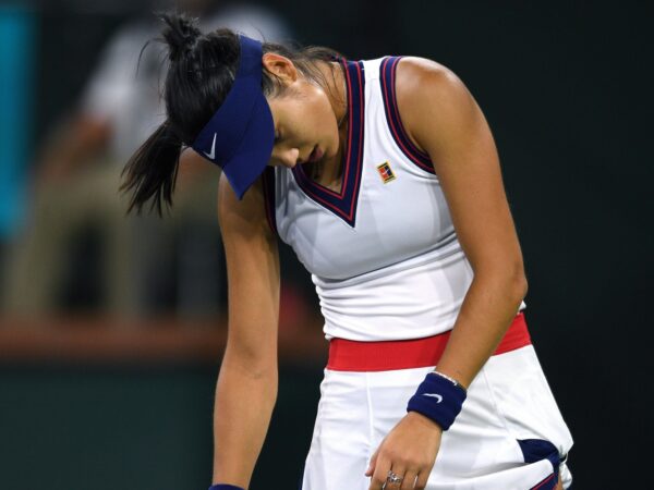 Emma Raducanu reacts after losing a point to Aliaksandra Sasnovich at the Indian Wells Tennis Garden.
