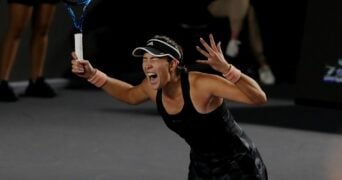 Spain's Garbine Muguruza celebrates after winning her group stage match against Czech Republic's Barbora Krejcikova