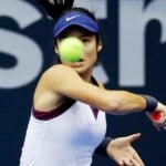 Britain's Emma Raducanu in action during her round of 16 match against China's Wang Xinyu at the Upper Austria Ladies Linz