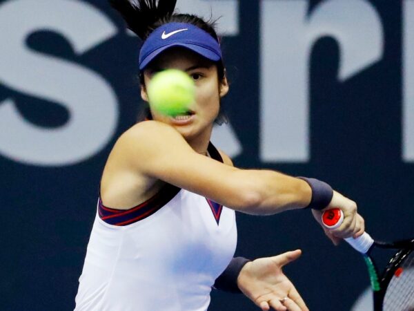 Britain's Emma Raducanu in action during her round of 16 match against China's Wang Xinyu at the Upper Austria Ladies Linz