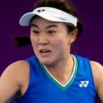 Lin Zhu of China in action during the second qualifications round of the 2021 Qatar Total Open WTA 500 tournament