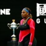 Serena Williams of the U.S. reacts after winning the first set during her quarter-final match against Romania's Simona Halep