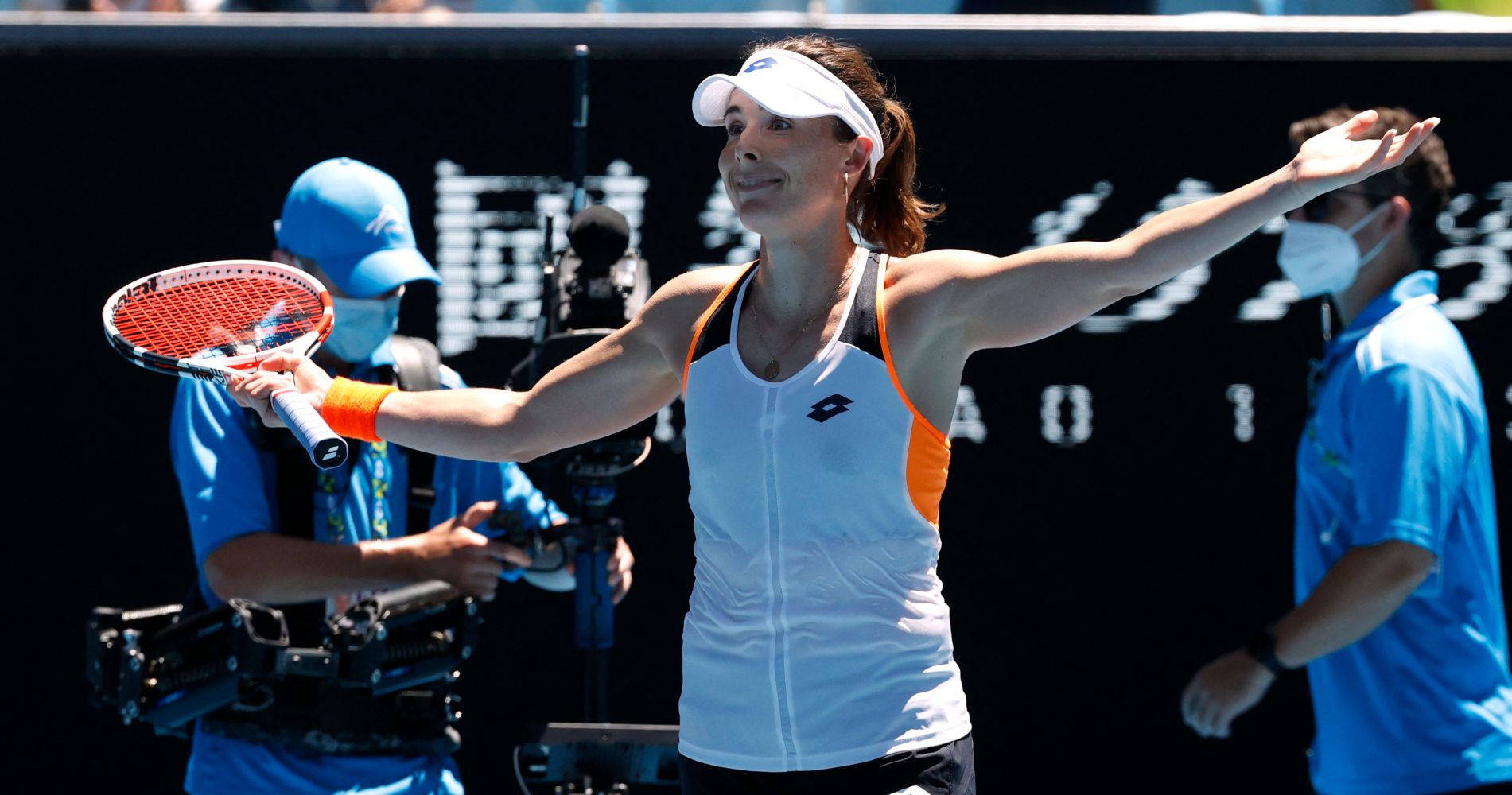 France's Alize Cornet celebrates winning her third round match against Slovenia's Tamara Zidansek at the Australian Open