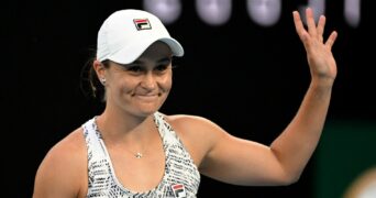Australia's Ash Barty waves at fans at the 2022 Australian Open