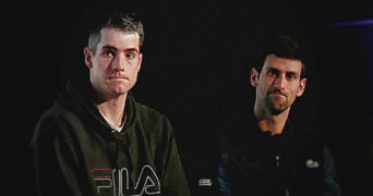 John Isner and Novak Djokovic in 2018