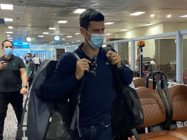 Novak Djokovic walks at Dubai Airport in Dubai, United Arab Emirates, January 17, 2022.