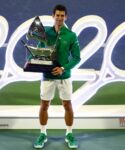 Serbia's Novak Djokovic poses with the trophy after winning the Final against Greece's Stefanos Tsitsipas at the Dubai Duty Free Tennis Championships