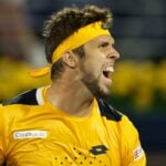 Czech Republic's Jiri Vesely celebrates winning his quarter final match against Serbia's Novak Djokovic at the Dubai Tennis Championships