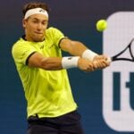 Casper Ruud (NOR) hits a backhand during his men's singles quarterfinal match in the Miami Open at Hard Rock Stadium.