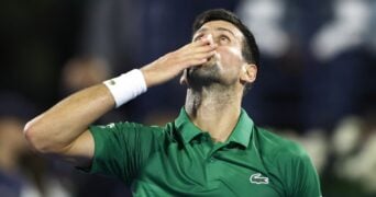 Serbia's Novak Djokovic celebrates winning his second round match at the Dubai Tennis Championships