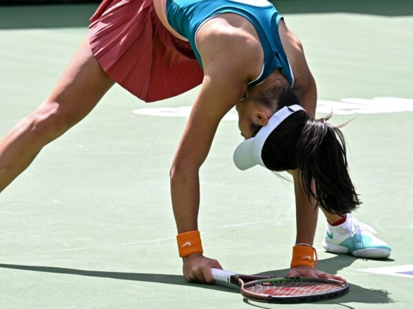Emma Raducanu (GBR) reacts after missing a shot during a loss to Petra Martic (CRO) in a third round match at the BNP Paribas Open at the Indian Wells Tennis Garden.
