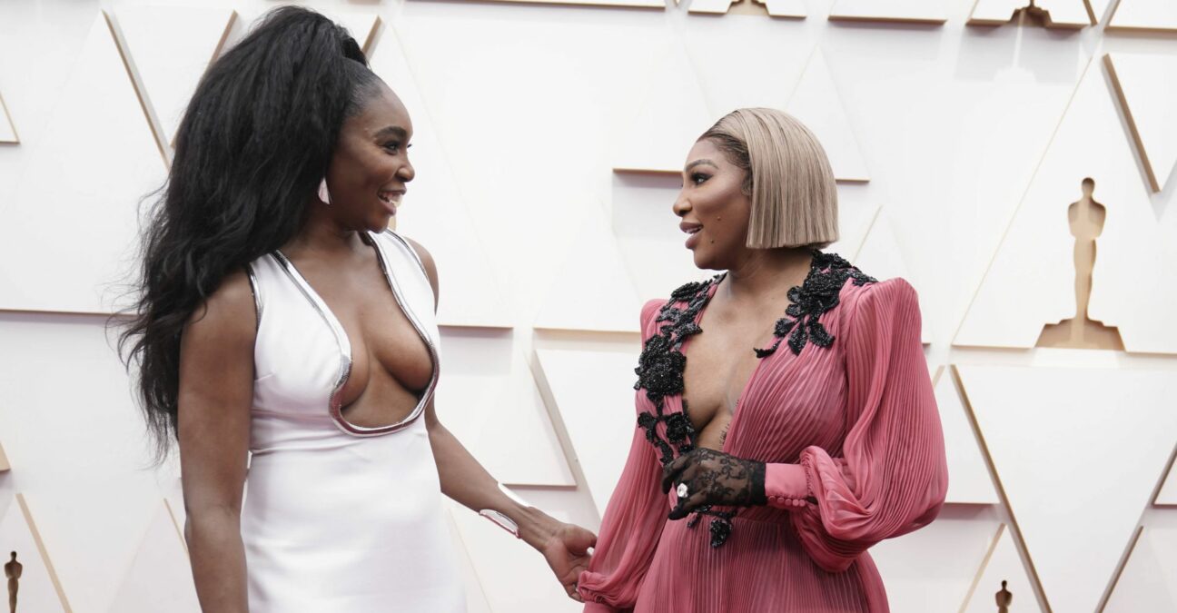 Venus Williams, left, and Serena Williams arrive at the Oscars on Sunday, March 27, 2022, at the Dolby Theatre in Los Angeles.