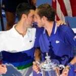 Novak Djokovic, of Serbia, talks with Daniil Medvedev, of Russia, during the trophy presentation after the men's singles final at the 2021 U.S. Open tennis tournament