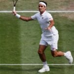 Switzerland's Roger Federer in action during his quarter final match against Poland's Hubert Hurkacz at Wimbledon in 2021
