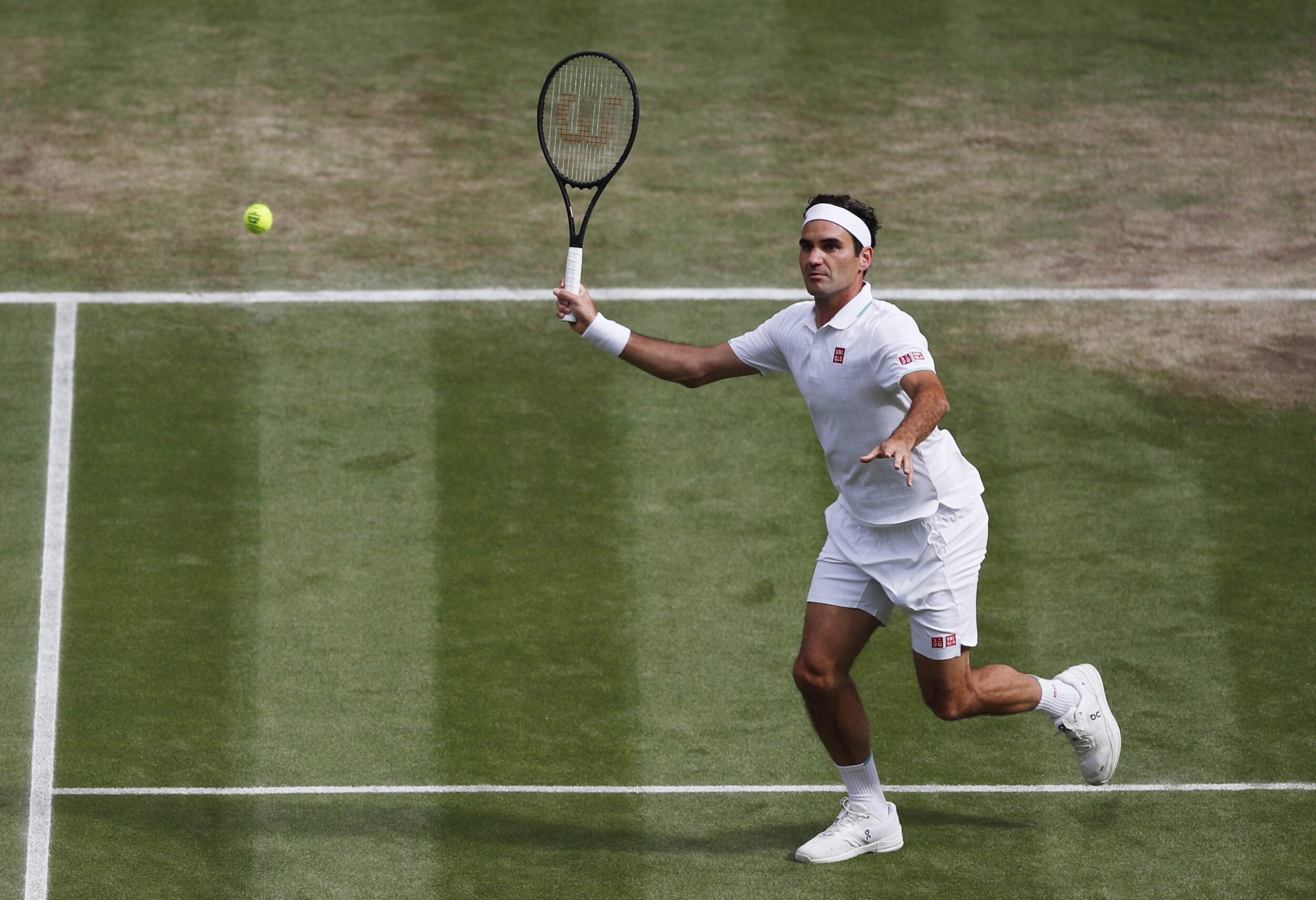 Switzerland's Roger Federer in action during his quarter final match against Poland's Hubert Hurkacz at Wimbledon in 2021