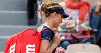 Spain's Paula Badosa leaves the court after retiring injured from her third round match against Russia's Veronika Kudermetova at the French Open