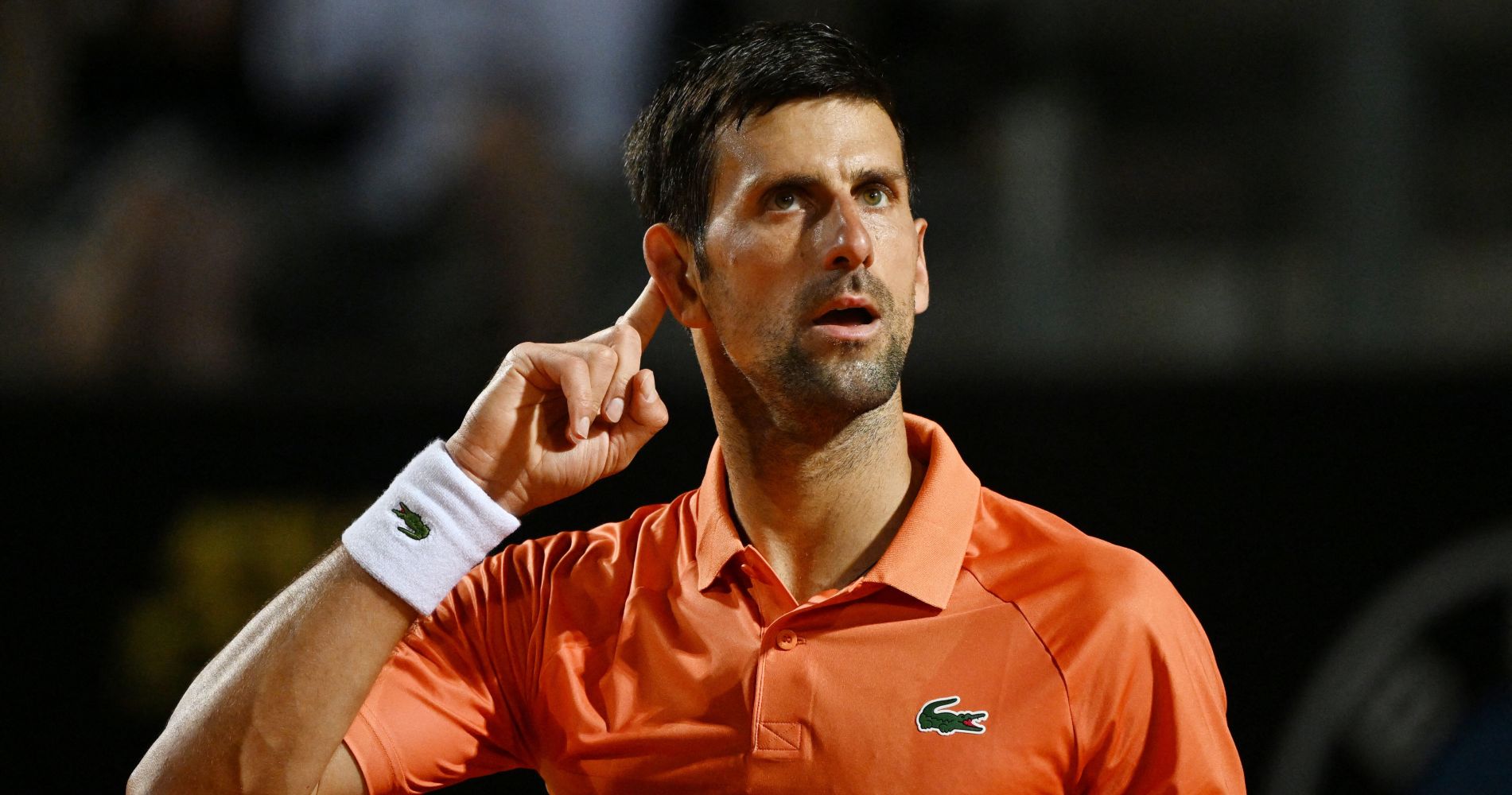 Serbia's Novak Djokovic celebrates winning his quarter final match against Canada's Felix Auger Aliassime at the Italian Open in Rome