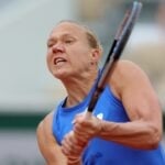 Estonia's Kaia Kanepi in action during her first round match against Spain's Garbine Muguruza at Roland-Garros