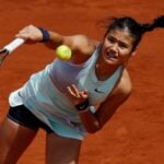 Britain's Emma Raducanu in action during her second round match against Belarus' Aliaksandra Sasnovich at the French Open