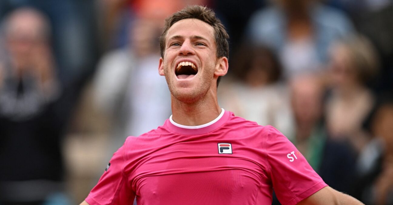 Argentina's Diego Sebastian Schwartzman celebrates after winning his third round match against Bulgaria's Grigor Dimitrov at the French Open