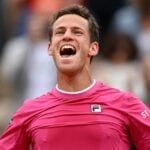 Argentina's Diego Sebastian Schwartzman celebrates after winning his third round match against Bulgaria's Grigor Dimitrov at the French Open