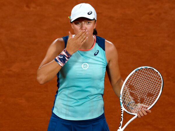 Poland's Iga Swiatek celebrates winning her first round match against Ukraine's Lesia Tsurenko