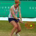 5th June 2022; Surbiton Racket & Fitness Club, Surbiton, London, England: Surbiton Trophy Tennis tournament, womens singles final: Arina Rodionova (AUS) versus Alison Van Uytvanck (BEL): Alison Van Uytvanck (BEL) plays a backhand back to Arina Rodionova (AUS) || 232781_0010 england FINAL Grass Court LAWN LONDON Singles SPORTING sports tennis trophy WOMENS