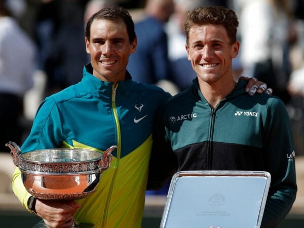 Spain's Rafael Nadal and Norway's Casper Ruud pose with trophies after the men's singles final at Roland Garros 2022