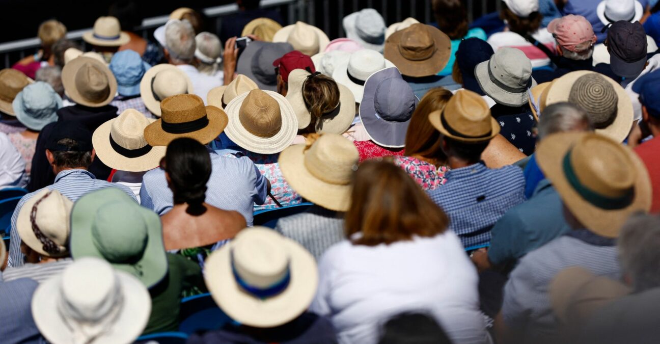 Spectators watch tennis at the Eastbourne International