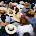 Spectators watch tennis at the Eastbourne International