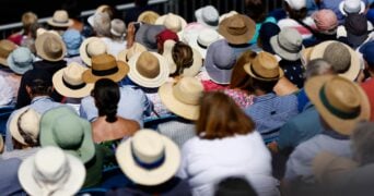 Spectators watch tennis at the Eastbourne International