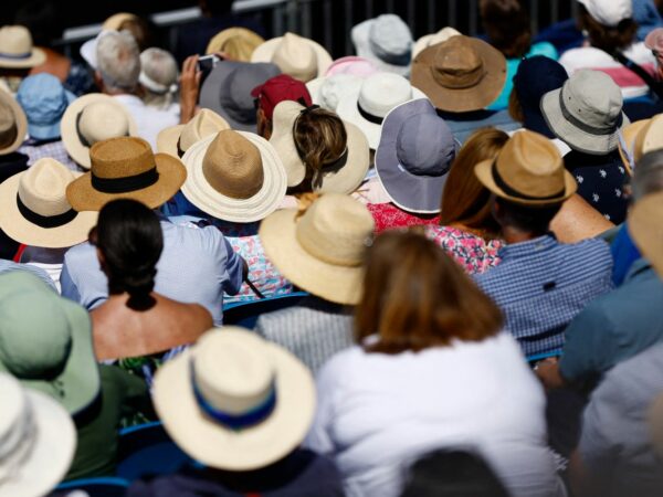 Spectators watch tennis at the Eastbourne International