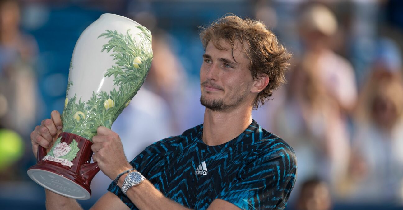 Alexander Zverev poses with the trophy after winning the Western and Southern Open final in Cincinnati