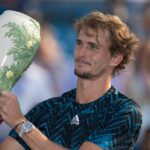 Alexander Zverev poses with the trophy after winning the Western and Southern Open final in Cincinnati
