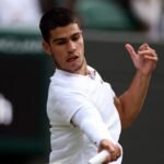 action during his third round match against Germany's Oscar Otte at Wimbledon 2022