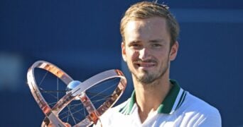 Daniil Medvedev of Russia poses with the trophy at the National Bank Open at Aviva Centre.
