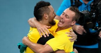 Lleyton Hewitt and Nick Kyrgios of Australia celebrate