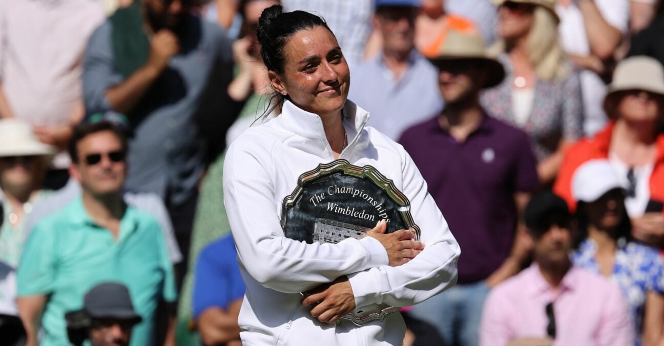 Ons Jabeur (TUN) poses with the runners up plate at the Wimbledon Championships