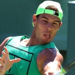 Rafael Nadal hits a return during a practice session for the Miami Open