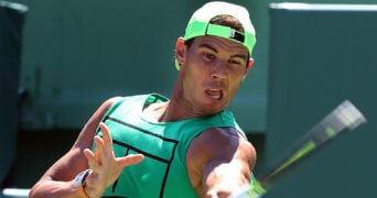 Rafael Nadal hits a return during a practice session for the Miami Open