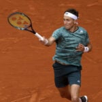 Casper Ruud hits a forehand