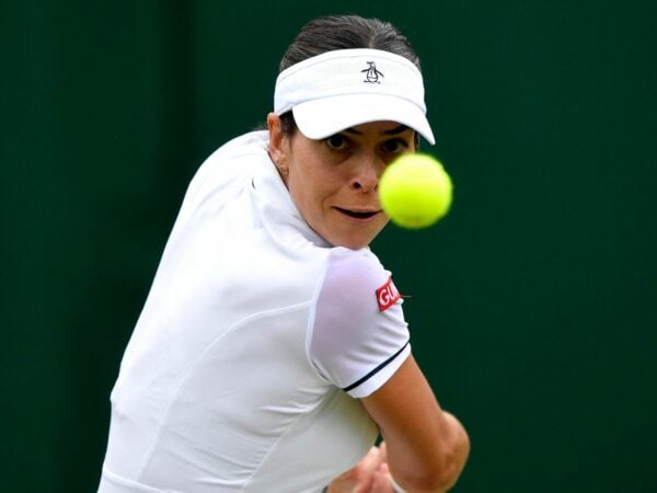 Australia's Ajla Tomljanovic in action during her fourth round match against France's Alize Cornet at Wimbledon 2022